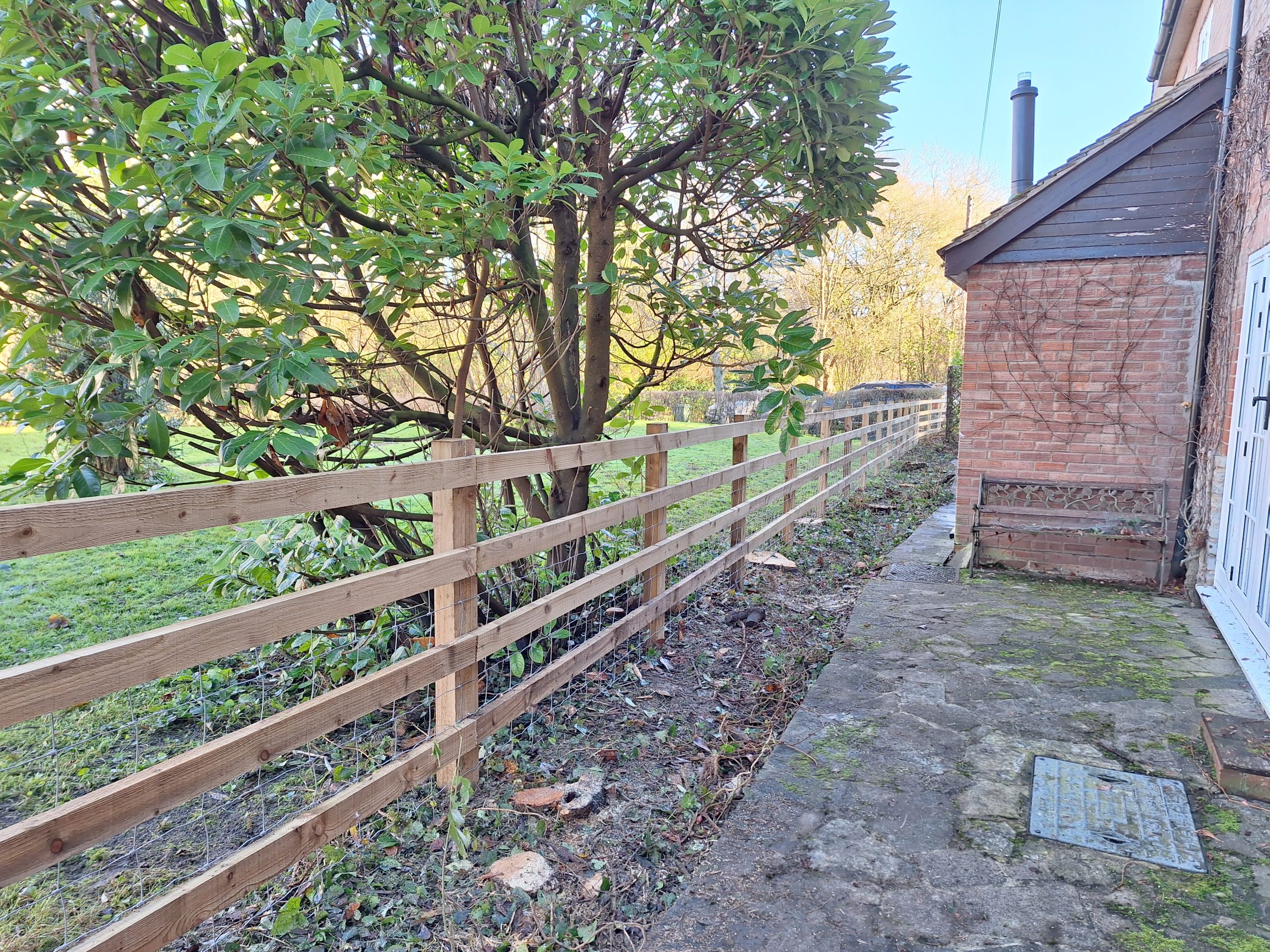 Post & rail, beside house