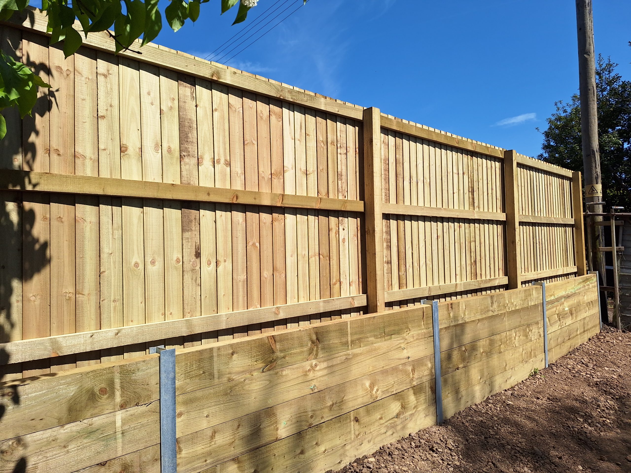 Close board fence installation, new timber