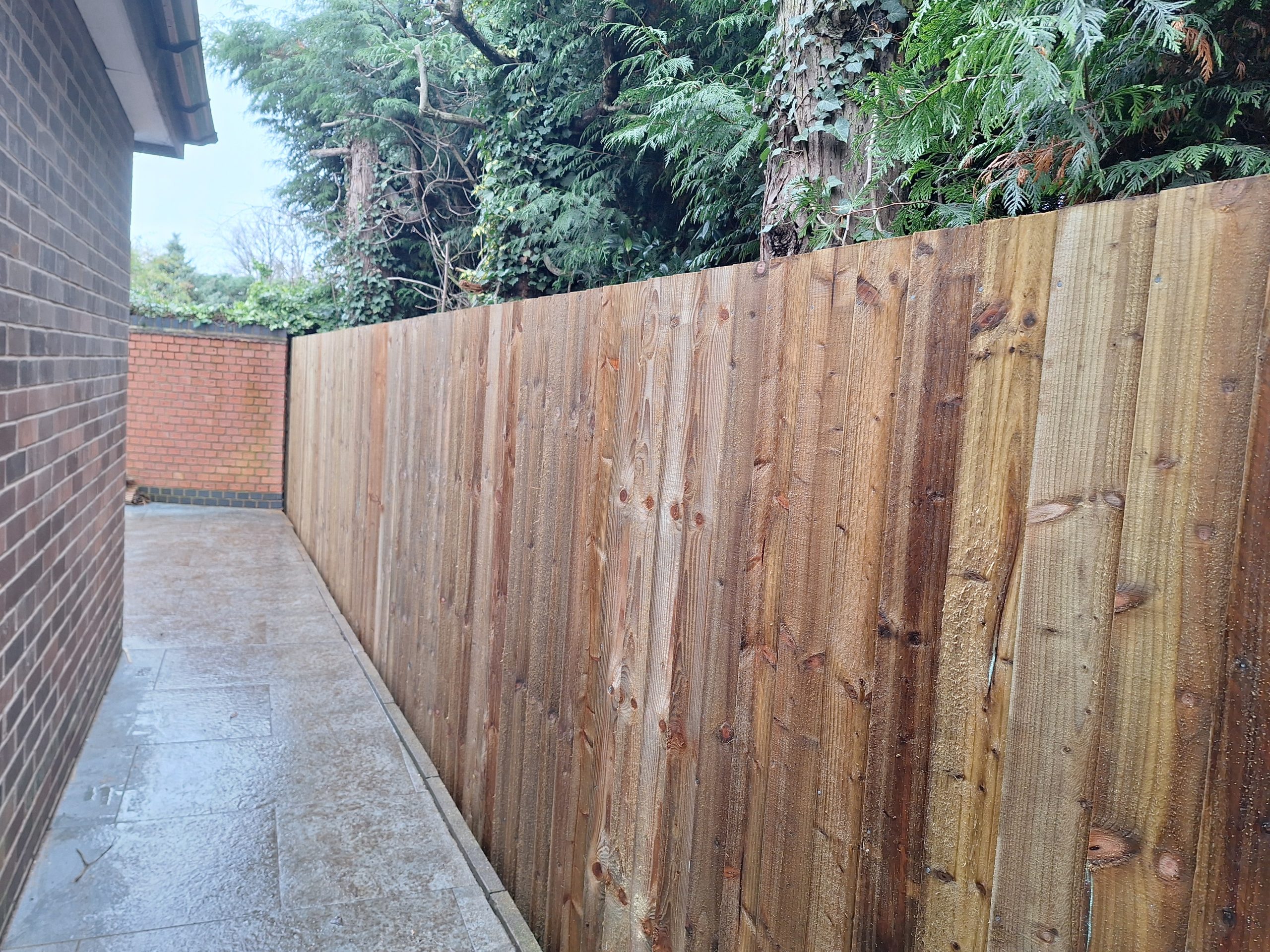Close board feather edge fence