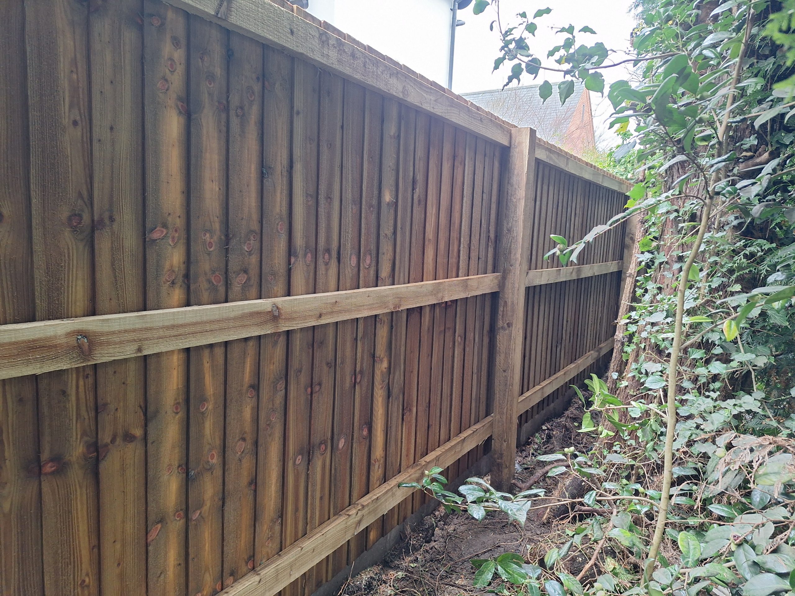 Close board fence tarmac