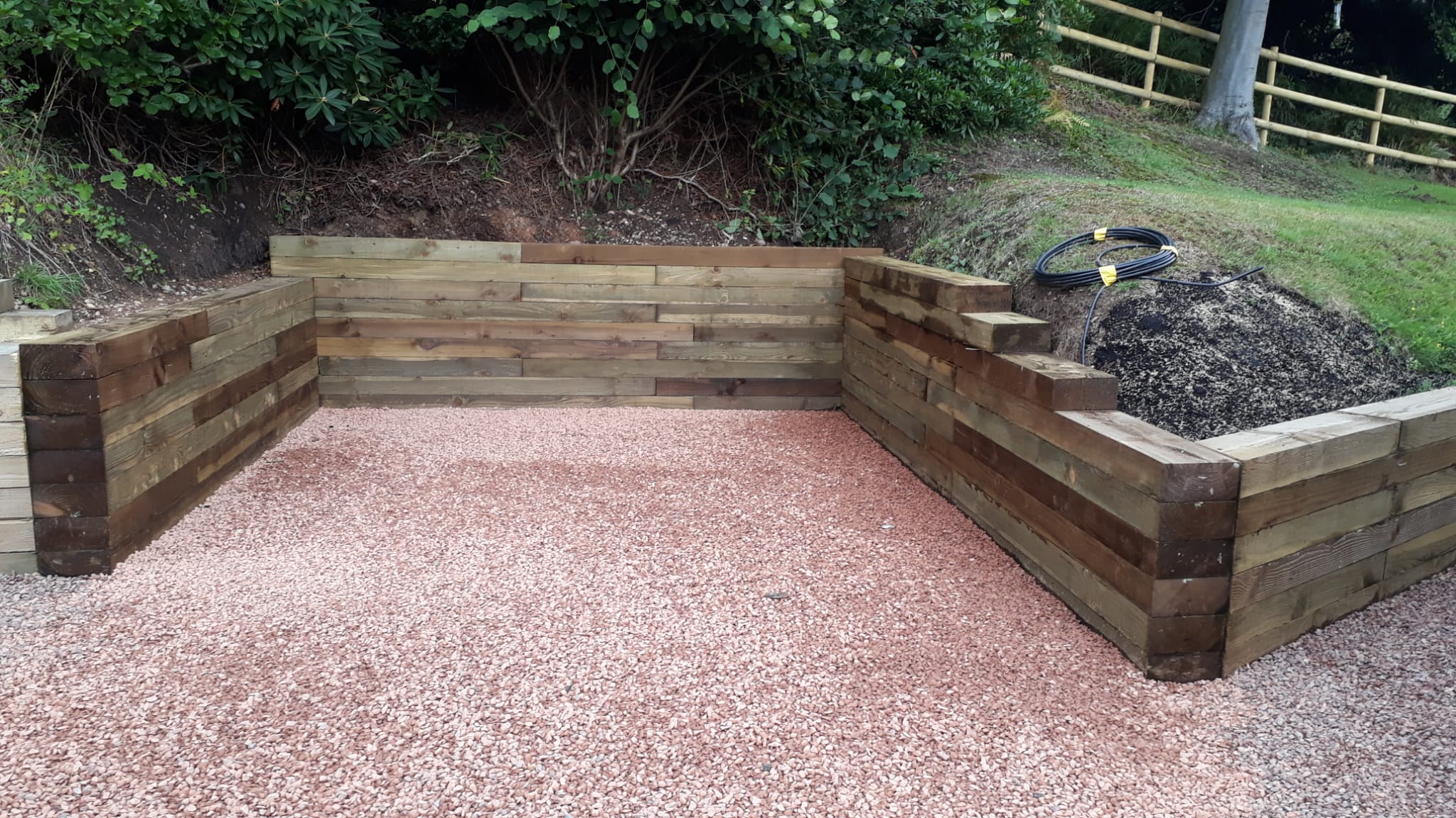 Timber sleeper raised bed with gravel